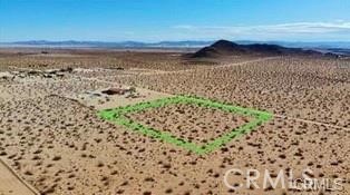 2.28 acres in famous Joshua Tree. Property appears to have water and power close. Property Power appears to be next door. Buyers to verify.
Build your designer dream compound. 12 miles to Joshua Tree National Monument. Very hot vacation rental area. Not far from the trendy JT Village with organic restaurants, cafes, the farmers market, and JT Saloon. Enjoy off-road adventures in the Joshua Tree Lake Bed and Johnson Valley ORV area. 42 miles to Palm Springs. 64 miles to Big Bear Lake. 135 miles to Los Angeles. Joshua Tree National Park’s off-season visitation was up 12.8% between June 2023 to October 2023. Final visitation numbers for 2023 are 3,282,575 visits, an overall 7% increase over 2022, and another record-breaking year. Buyers must contact the county of San Bernardino planning department with all questions on building and uses. Buyers must contact the utilities agencies with questions and verifications of utilities. Address is not a real address and is for marketing purposes only. Don't Wait! - Call Now! APN: 0632-031-07-0000 GPS: 34.212925, -116.293220