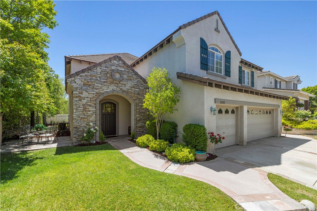 Experience Luxury Living In This Beautifully Crafted Executive Home Nestled In The Heart Of Stevenson Ranch! Spanning nearly 3,500 square feet, this 4 bedroom 4 bathroom beautifully appointed home offers an ideal blend of sophistication and functionality. The thoughtfully designed floor plan features wood flooring throughout the main level, complemented by formal living and dining rooms . At the heart of the home is an expansive, updated kitchen with abundant cabinetry and counter space, seamlessly opening to the inviting family room adorned with a cozy fireplace, perfect for both relaxed evenings and stylish entertaining. Upstairs, a spacious loft provides versatile space for a second family room, home theater, office, or playroom. The luxurious primary suite is a true retreat, showcasing mountain views, a spa-inspired ensuite bath, and dual walk-in closets. Walk outside to a generous backyard, ideal for outdoor entertaining or enjoying peaceful evenings. This home also includes a well-sized laundry room and an attached 3-car garage. Located close to parks, award-winning schools, shopping, and dining, this turn-key home presents an exceptional opportunity to own in one of Santa Clarita Valley’s most sought-after neighborhoods.