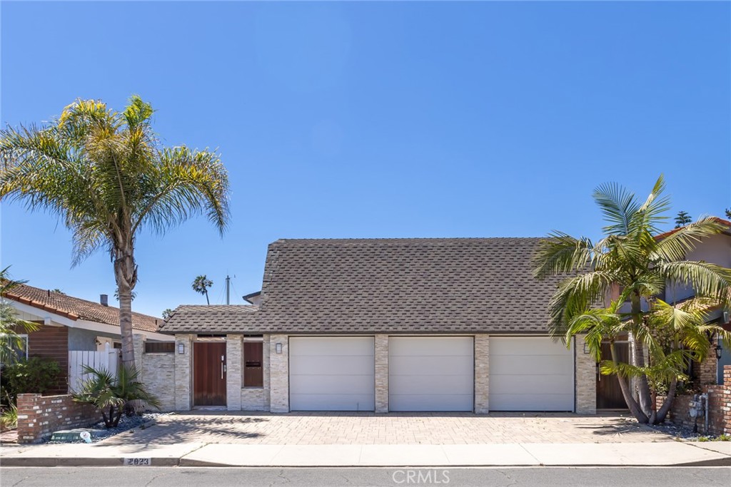 Gorgeous Ventura peninsula home with beautiful, front facing channel views! Boasting four bedrooms and three bathrooms, this home has water views from the second story primary suite, with 2 adjacent guest bedrooms. The home has been renovated with taste and simplicity. The newly renovated kitchen is a chef's dream and entertainment haven. The open air kitchen is equipped with 2 fully-opening awning windows to the water. Perfect for BBQ's or a relaxing weekend. The kitchen has been updated with Taj Mahal Quartzite island, counters and backsplash, high-end Thermador appliances, custom made cabinets, and a large walk-in pantry. Your very own boat dock sits on 35'of Trex decking, and the outdoor living lends itself to water recreation, paddle boarding, and light sunset sailing. The garage comfortably fits 2 cars, and can also be used for extra storage. Nestled on the top floor of the garage is a finished, extra playroom/bonus space, accessible by spiral staircase. It has a tankless water heater and newer roof installed. Whether you are looking for a vacation home, a place to escape the hustle and bustle of the city, or a permanent relaxation retreat, look no further than the Ventura Keys.