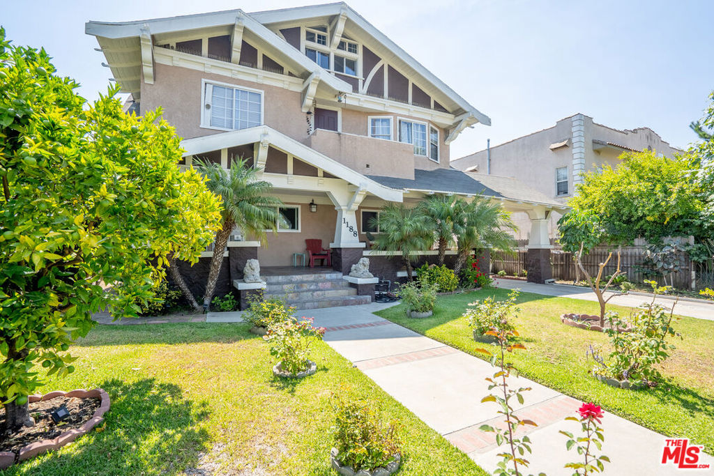 Located in the historic and highly sought-after Country Club Park near Korea-town, USC, and the 10 Freeway, this charming gated Craftsman triplex offers a beautifully remodeled first-floor 3BD/2BA unit for lease. Enjoy exclusive access to a spacious front porch perfect for relaxing under the lime tree while overlooking the manicured front garden. Inside, the generous floor plan features a bright and expansive living room, remodeled kitchen with granite countertops, ample cabinetry, and a conveniently located guest bathroom. All bedrooms are extra-large with laminate wood flooring throughout. Two of the bedrooms offer direct access to the backyard and parking area, and share a Jack-and-Jill style bathroom. Additional conveniences include a coin-operated laundry (owner-operated) located inside the unit and 3 dedicated parking spaces in the gated rear lot. A rare opportunity to live in a well-maintained home with timeless character and modern updates.
