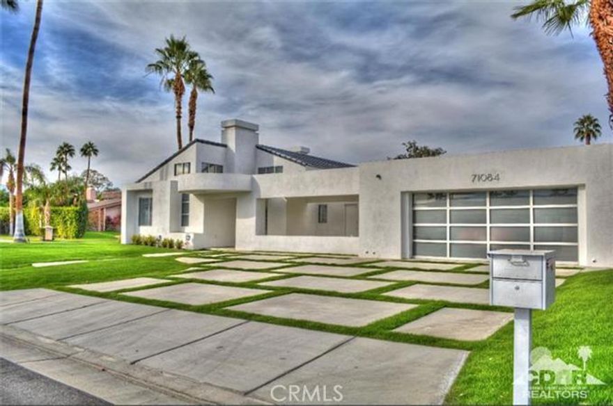 Just reduced! Seller is motivated to sell! This sleek, edgy contemporary in prestigious Tamarisk area of Rancho Mirage invites indoor/outdoor entertaining. Open floor plan with stark white marble floors and soaring ceilings to abundant natural light! Pool, spa, breathtaking views, outdoor kitchen and hushed privacy create one's private Shangri La! Furniture is available outside of escrow!