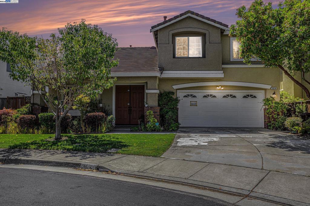 Welcome to this stunning two-story single-family residence situated in the very desirable country club community, providing the optimal combination of comfort, style, and convenience. Enter through the front door into a large living and dining room highlighted by vaulted ceiling and gorgeous bamboo flooring, providing a warm and playful ambiance. The remodeled kitchen is a chef's dream, providing a center island, pantry, bay window, and breakfast nook, flowing into the cozy family room which is perfect for everyday living and entertaining. A first-floor bedroom offers guest space versatility. On the second story, there's an open loft area ideal for an office or lounge, as well as four spacious bedrooms, including the opulent master suite. The master bedroom features scenic views, two walk-in closets, and a master bath with designer shower stall and soaking tub. A bathroom along the hallway nicely serves the remaining bedrooms. Live outside in the fully landscaped yard, including lush plantings and full paver hardscape for maintenance-free beauty. A charming front yard enhances the home. Conveniently located near shopping districts, highways, and other amenities, this home is the perfect blend of luxury and comfort in a highly desirable area. Visit it today!