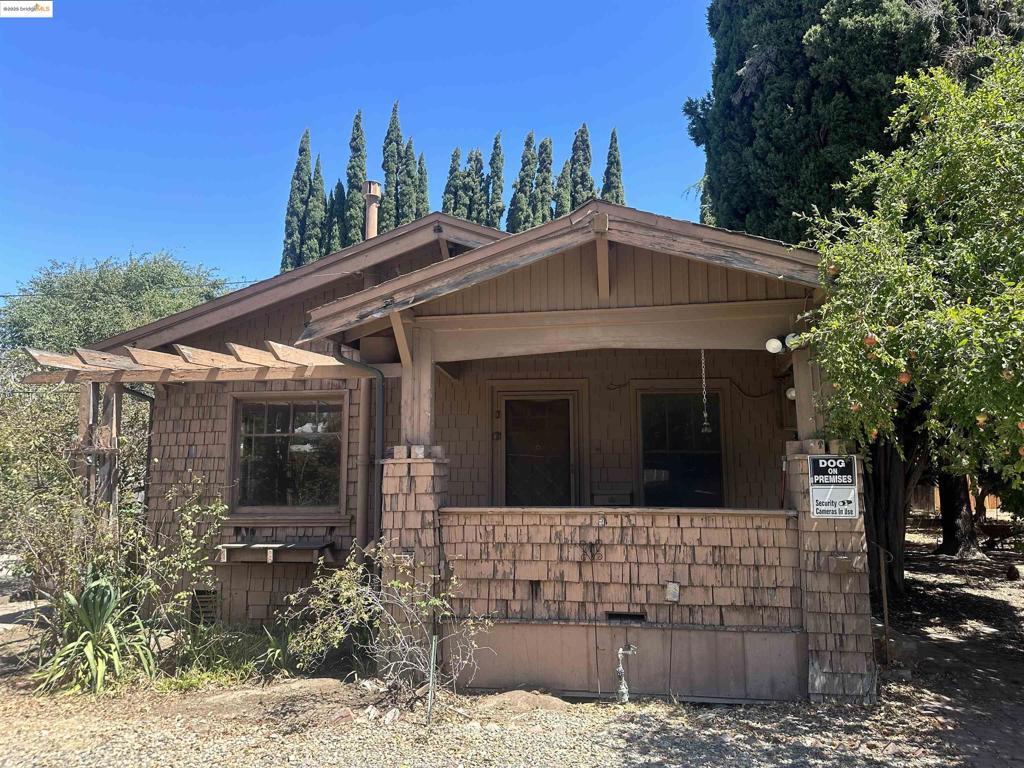 Welcome to 1511 D St, a charming single-family detached home in Antioch, CA that combines comfort with convenience. This delightful residence offers 984 square feet of living space, featuring two bedrooms and one and a half bathrooms. With western exposure, the home is bathed in natural light, highlighting the beautiful hardwood floors that flow throughout. The eat-in kitchen is perfect for casual dining and provides a cozy setting for meal preparation. For those who enjoy outdoor relaxation, the property includes a welcoming porch, a spacious back yard, and a garden area, ideal for gardening enthusiasts or simply enjoying the outdoors. Equipped with modern amenities, this home offers air conditioning and electric heat, ensuring comfort throughout the year. The convenience of included appliances such as a washer and dryer adds to the home's functionality. Parking is a breeze with on-site parking, included parking, and additional street parking available, accommodating multiple vehicles with ease. This property presents a wonderful opportunity for those seeking a comfortable and inviting home. Don't miss the chance to make 1511 D St your new address. Schedule a viewing today and experience all the charm and convenience this home has to offer!
