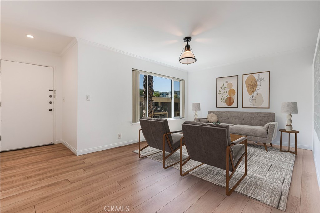 Tucked away in one of the most desirable pockets of Studio City, this well-maintained studio condominium offers an ideal blend of privacy, smart design, and walkable convenience—all in a space that feels larger than it appears on paper.
Thoughtfully configured with a partitioned layout, the sleeping area is subtly separated from the main living space, giving the home the feel of a true one-bedroom without compromising flow or function. Natural light pours in through multiple windows and overhead skylights, creating a bright, airy atmosphere throughout the day. The unit also offers excellent storage, including multiple closets and dedicated storage areas rarely found in studio living.
Set toward the back of the complex, the condo enjoys a uniquely quiet and private setting—shielded from street noise and just steps from community amenities. Enjoy quick access to the gated pool and heated spa, as well as several conveniently located laundry facilities just around the corner from your door.
This gated and secure community is beautifully landscaped and well maintained, with plenty of guest parking.
Situated in the heart of Studio City, just moments from top restaurants, nightlife, grocery stores, and boutique shopping—including Trader Joe’s, Erewhon, and some of LA’s best sushi. Plus, with close access to the 101, 134, and 170 freeways, getting anywhere in the city is simple.