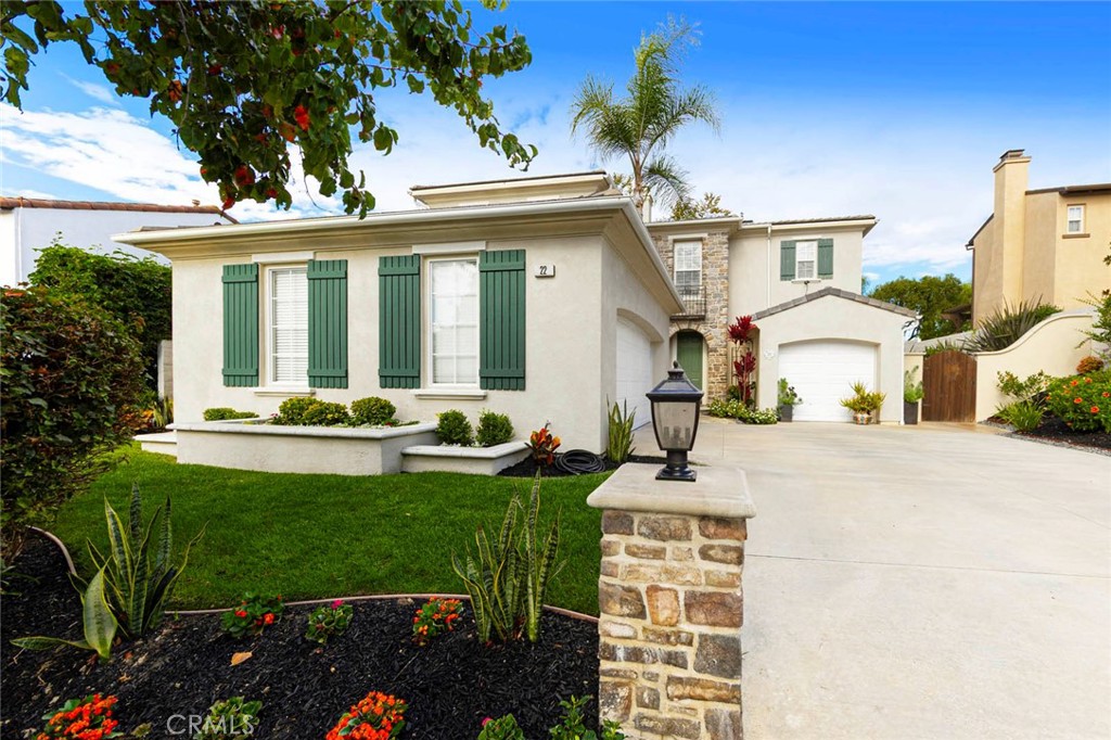 Experience the ideal fusion of modern design and coastal charm in this beautifully remodeled 4-bedroom, 3-bathroom home with a versatile bonus area, located in the highly desirable Portofino community of Talega. Perfectly positioned on a quiet street just a short stroll from Vista Del Mar TK-8, this home offers the ultimate in family-friendly living — with resort-style amenities, scenic trails, and top-rated schools all within reach.
Step inside to discover an inviting open-concept floor plan designed for today’s lifestyle, anchored by a stunning remodeled kitchen featuring floor-to-ceiling windows, new custom cabinetry, designer fixtures, Thermador appliances and an expansive island ideal for gathering. The kitchen seamlessly connects to the open family room, highlighted by a custom built-in bar/beverage area that creates a warm and stylish entertainment area.  Main floor bedroom, currently being used as office and fully remodeled bathroom complete this lower level.
The spacious primary suite is a private retreat, highlighted by luxurious LVP wood flooring. The primary bathroom boasts a soaking tub, dual vanities with shiplap walls, walk-in shower, and oversized walk-in closet. Upstairs you’ll also find two additional bedrooms, a fully remodeled bathroom, homework niche and a convenient laundry room.
Thoughtful upgrades throughout include solar power (lease), brand new luxurious LVP wood flooring thru out, new baseboards, new interior Shaker doors and trim, plantation shutters, new LED lighting fixtures, and fresh interior and exterior paint.
The private backyard is an entertainer’s delight, lush landscaping, lawn space, and a built-in BBQ, fireplace area- and there are no homes directly behind you! This is the perfect home for entertaining or just relaxing!  The third car garage is the bonus area complete with heating and A/C. Another benefit this home has to offer is an extra-long driveway to fit multiple cars. 
Enjoy all that Talega has to offer, with resort-style amenities including pools, sport courts, parks, and miles of hiking and biking trails. Short walk to shopping, Peets’ Coffee, restaurants and Talega Golf Course. Welcome home! 
This exceptional home combines comfort, modern elegance, and lifestyle — a true must-see!
