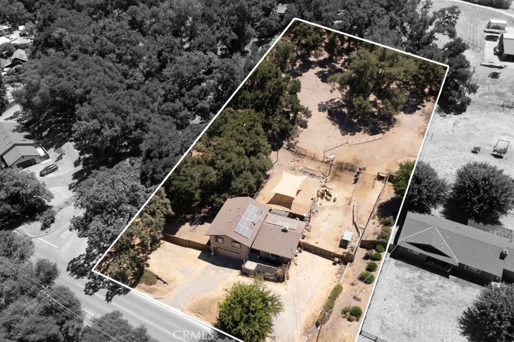 Looking for your next fixer-upper on a full acre of usable land? Nestled in rural Atascadero, this property offers the peace of country living with city conveniences just minutes away. Enjoy quick access to Highway 101, Kidwell Park, and the growing downtown scene. The two-level home features an open layout and generous living space, plus three bedrooms upstairs, including a primary suite with a balcony overlooking the backyard and Atascadero’s rolling hills. A spacious two-car garage and side gate provide direct access to the fully fenced backyard. The property includes a side yard, existing pens, and open acreage—perfect for entertaining, building, or raising animals such as horses, goats, sheep, or pigs. Whether you envision adding an ADU or workshop, starting a hobby farm, or simply enjoying wide-open space, this home is a blank canvas for your ideal Central Coast retreat. Bonus: the home is equipped with solar.