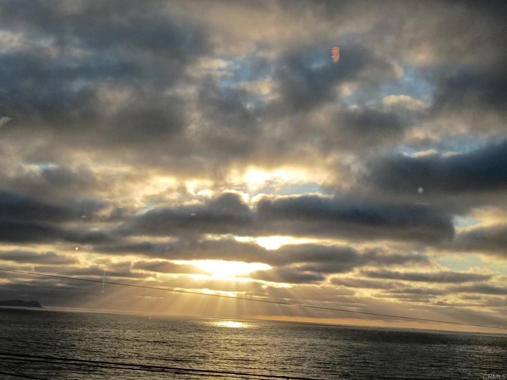 Completely furnished 2 bedroom 2 bath home with direct access to a very long stretch of sandy and SECLUDED BEACH. The location could not be better if you are looking for peace and tranquility. It is just minutes from the border, right next to San Antonio Del Mar but still close enough to downtown Rosarito for shopping and entertainment. As you enter into the home you encounter a huge open space. Kitchen to the right with new cabinets and granite counter tops. A large living space with open beam ceilings and a fireplace. Perfect for entertaining or just enjoying the stunning sunrise and sunsets. Loads of windows for letting in the breeze. This is all one level, no stairs what so ever. Very hard to find any where in Rosarito is the size of the lot itself. It gives the owner many more options like structurally expanding the home AND building a 4 car garage! The community is Campo Torres the annual space rent is only $4,950. It will be hard to find a neighborhood such as this one, with such a perfect location.