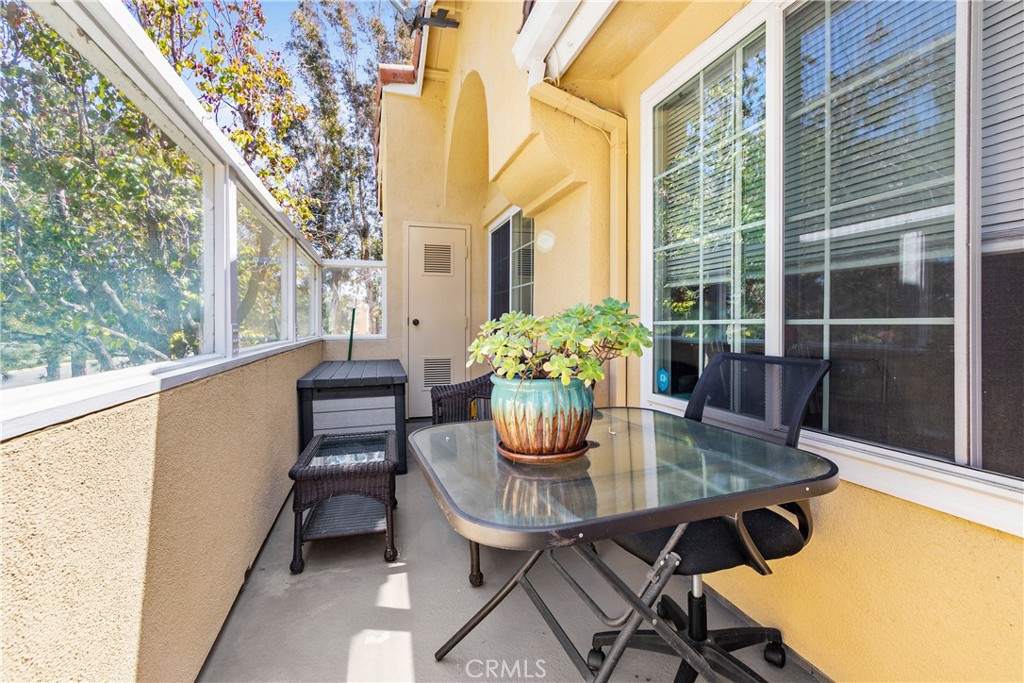 This two-bedroom, two-bath upper unit condo offers a comfortable and contemporary living space that is both stylish and functional. Situated in a well-maintained condominium complex, this unit boasts a range of features designed to enhance your everyday living experience. Up garden kitchen cabinet & counters and bathrooms. Laminated wood flooring newer windows. Community pools, spa and tennis courts. Close proximity to shopping centers and freeways and one assigned carport