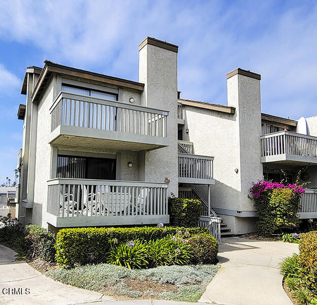 Located near the Channel Islands Harbor, waterfront dining, weekend farmers market and endless coastal recreation, live the beach lifestyle in this beautifully updated ocean view townhome in the desirable Harborwalk community of Hollywood Beach. Features include * Spacious bright and cheerful living room with fireplace and south facing deck with exceptional ocean view * New vinyl plank flooring throughout * Roomy dining area and den * Remodeled kitchen with quartz countertops, tile backsplash and stainless steel appliances * Remodeled baths * interior washer and dryer * Two enclosed parking spaces and storage locker. Complex amenities include a clubhouse, 4 pools with spas, 2 lighted tennis courts and RV storage area.