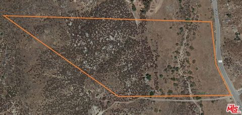 Photo of 33211 Sage Rd, Hemet, CA 92544 (MLS # 25511587)
