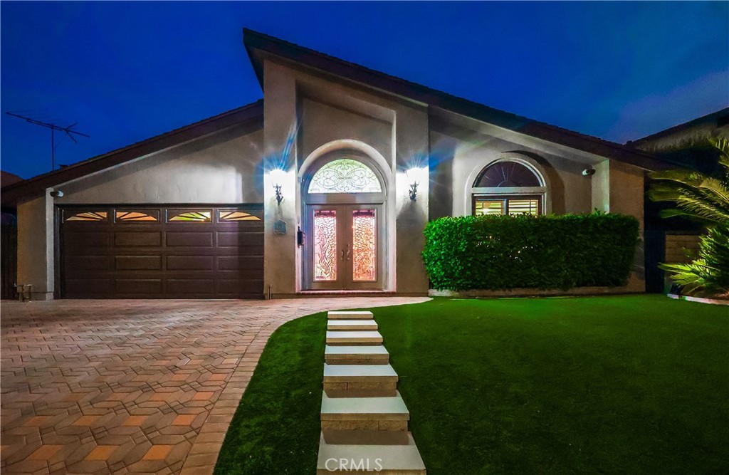 Welcome to 1319 Mount Rainier in Rancho Palos Verdes – a stunning home in the highly desirable Strathmore neighborhood. This beautifully upgraded 4-bedroom, 2-bathroom residence offers 1,729 square feet of thoughtfully designed living space and is truly a must-see. As you step inside, you're greeted by an elegant entryway featuring a beautiful chandelier and an open floor plan that is flooded with natural light. The custom kitchen is a true showstopper, perfectly designed for both everyday living and entertaining guests. To the right of the entry, you'll find a spacious master suite with a custom-designed closet, offering both style and function. Three additional bedrooms are located to the left of the entry way, providing ample space for family, guests, or a home office. The private backyard is a true oasis for relaxation and entertainment. Enjoy endless fun in the saltwater pool with a rock slide, or host unforgettable gatherings with the fully equipped outdoor barbecue kitchen and built-in stereo speakers. This home boasts numerous recent upgrades for peace of mind, including a brand new roof, fresh interior and exterior paint, and a fully paid-off solar system for maximum energy efficiency. Additional features include dual-pane Milgard windows, a hardwired security camera system, an underground drip irrigation system, and convenient storage lofts in the garage. Don't miss your chance to own this exceptional property in a top-tier community. It's more than a home; it's a lifestyle.