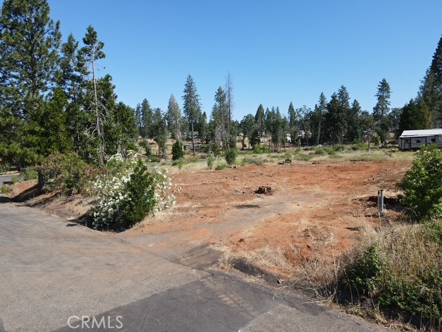 Great, level and cleared lot in lower Paradise Pines. Cul-de-sac street that is close to main roads for easy commute. Septic system is in place with diverter valve for three bedroom home. Tank will need to be replaced. See supplements for the permit and as-built of the septic.
