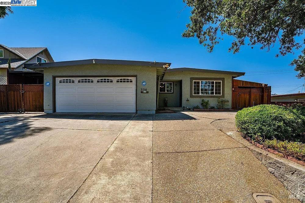 Originally a 3BR/2BA home, one wall was removed to create a more spacious bedroom. The home is now configured as a 2BR/2BA, offering a larger second bedroom while maintaining the original square footage.