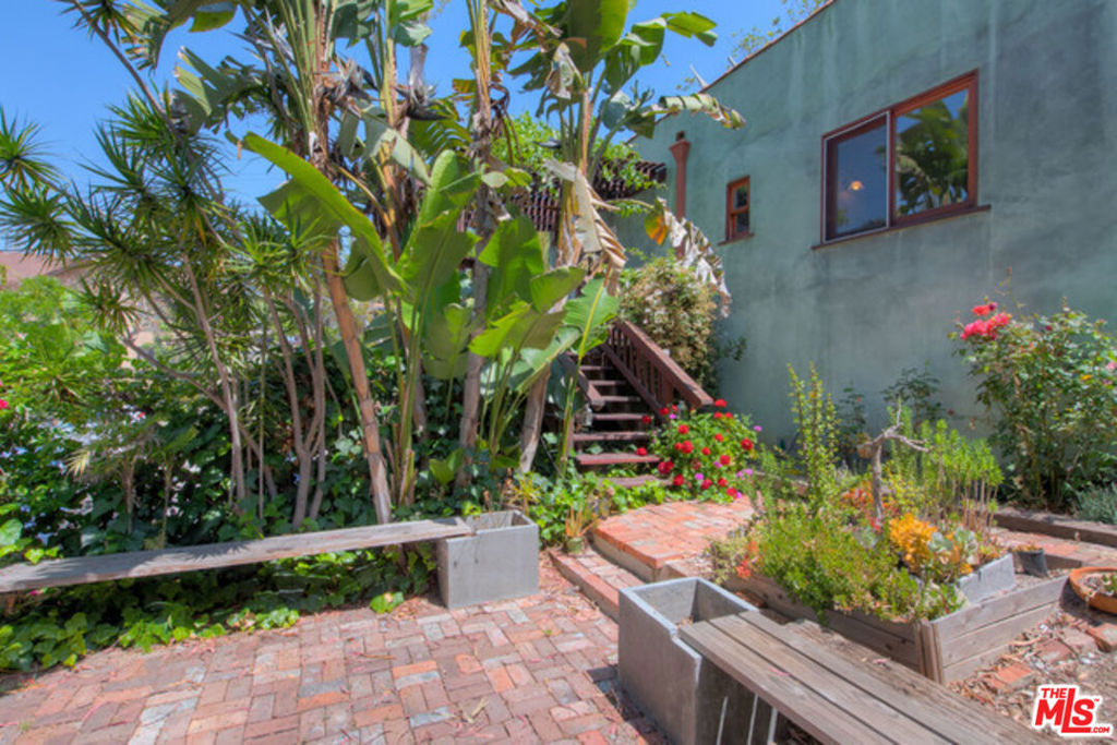 Tenants will fall in love with this fantastic Franklin Hills property. This charming, well-maintained two-unit attached home offers an updated 2-bedroom, 2-bath residence with stunning views of the Griffith Park Observatory and surrounding hills. The home features an updated kitchen and bathrooms, beautiful hardwood floors, and newer exterior stucco. Central heating and air conditioning provide comfort year-round. Situated on a hillside, the property offers a peaceful outdoor setting, complete with an enchanting fenced yard perfect for gardening or relaxation. A shared laundry room adds convenience for tenants.
