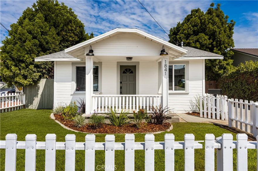 Welcome to 1841 253rd Street, a beautifully refreshed 3-bedroom, 2-bath single-story home that combines comfort, modern upgrades, and a fantastic South Bay location. From the moment you arrive, the charming exterior and welcoming front porch set the stage for a property that has been thoughtfully updated inside and out. The bright layout features a spacious living area that flows easily to the dining space and a fully renovated kitchen showcasing crisp white cabinetry, quartz-style countertops, an elegant tile backsplash, and brand-new stainless-steel appliances. The primary suite enjoys its own upgraded bath, while the additional bedrooms provide flexibility for guests, family, or a home office. Outside, a generous fenced backyard offers plenty of room for outdoor dining, gardening, or the potential for an ADU (buyer to verify). A detached garage, long driveway, and a dedicated workshop shed provide ample parking, storage, and space for creative projects or hobbies. Conveniently located near parks, schools, shopping, dining, and easy freeway access, this move-in ready Lomita home delivers a rare combination of style, functionality, and prime location—perfect for embracing the relaxed coastal lifestyle.