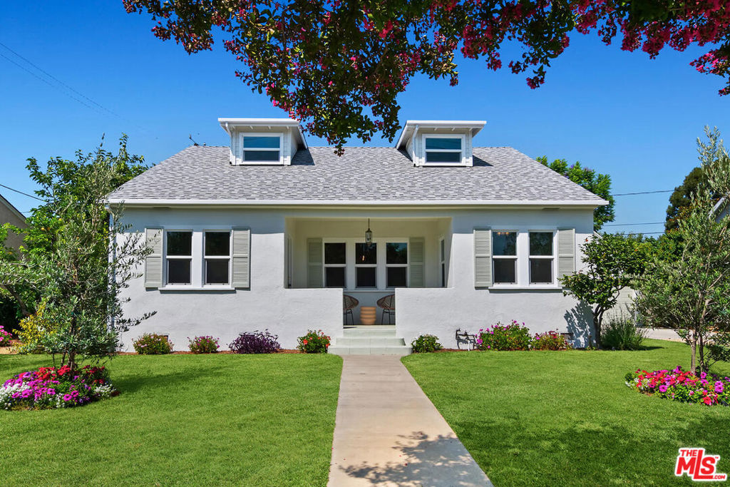 Character-filled Magnolia Park home located on a beautiful, tree-lined street near Toluca Lake. Features include a welcoming front porch, a bright living room with abundant natural light, a formal dining room, and a remodeled kitchen with new appliances and a spacious breakfast area. The home offers three bedrooms and a family room, with two bedrooms on the main level and a private bedroom upstairs.Recent updates include a new roof, hardwood and laminate flooring, new double-pane windows, newer central air and heating, a brand-new foundation, and upgraded 200-amp electrical service. There is also an indoor laundry room with a secondary entrance.The property sits on a professionally landscaped 7,300 sq. ft. lot with mature trees, impressive gardens, a patio, and a lovely backyard. The driveway accommodates three to four cars, and the detached garage offers excellent potential for a future ADU.