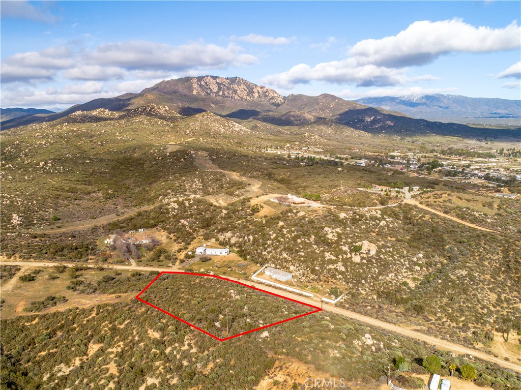 Great lot with just over 3 acres of land located in the Lake Riverside Estates. A quick 30 min drive from Temecula this is a fantastic area to live the rural life, but still be so close to towns. Whether you are looking to build a custom home or put a manufactured home this is a great deal. The gated community offers fantastic amenities to enjoy. Take a drive out for yourself to see the beauty this lake community has to offer with hiking, biking, and horse trails, a community pool, tennis, volleyball, picnic, and parks, an equestrian area, even a small airplane strip, and much more. This lot has a lake view from the top portion. A stone's throw away from the famous Olive Oil company and Temecula Wine Country this area is a hidden gem, you can quickly drive up and enjoy a day in the mountain of Idlywild or run over the mountain to play a game of golf in the Desert, so many options within a short drive. The boundary lines shown are approximate.