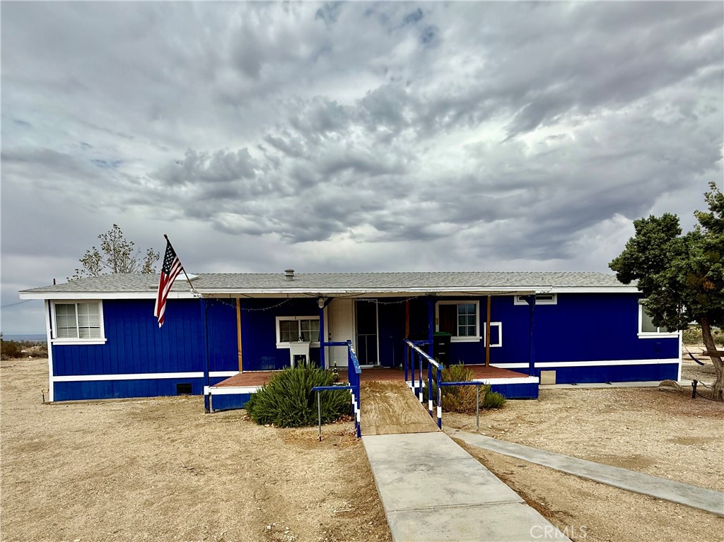 Country Living at Its Finest!
Enjoy unobstructed panoramic views of the Wrightwood Mountains, rolling valleys, and sparkling city lights from this stunning manufactured home on a permanent foundation, set on 2.5 acres of peaceful land. This home features 3 spacious bedrooms, 2 baths, and 1,674 sq. ft. of living space. Inside, you’ll find new flooring in most of the home, vaulted ceilings, and ceiling fans in every room. The open floor plan includes a large kitchen with an island and pantry, a separate dining room, and a welcoming family room with a wood-burning stove—perfect for cozy evenings. Each bedroom is generously sized, offering comfort and space for everyone. The indoor laundry room provides easy access to the back deck, where you can relax and take in the breathtaking sunrises, sunsets, and starry skies. The property is equally impressive outdoors, with features designed for convenience and lifestyle:
Detached 2-car garage with enclosed carport.
Mini greenhouse & large mature trees. Custom air-conditioned dog house. Two detached storage sheds
Dog kennel & 8-ft chain link fence enclosing the entire lot. Two gated entrances for easy access. Ample room for RV parking and all your toys.
Located in the sought-after Snowline School District, with easy access to Highway 138 and just 40 minutes from Rancho Cucamonga, this property offers the best of country living while still being conveniently close to the city.