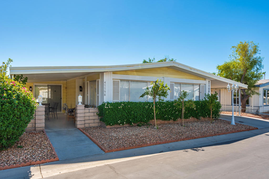 Indio - Beautifully maintained 3 brm, 2 bath manufactured home located in a desirable 55+ community at Coronado Gardens where you own the land & it's a 433A. This light filled home features 3 bedrooms & 2 full baths. Luxury vinyl flooring, new carpet, newly painted throughout the home. The bright & light kitchen, making it the perfect space for cooking and entertaining. The primary suite has been thoughtfully updated and includes a luxury-sized bathroom with a large shower, soaking tub, and updated lighting. Enjoy the two covered patios for relaxing or gathering with friends. One of the covered patio looking over the greenbelt. Additional features include a spacious indoor laundry room, and a large storage shed. This friendly community offers walking trails, a pool, a spa, a gym, billiards room, pickleball and clubhouse activities. It also has low HOA fees and IID electric rates. This perfect setup is for comfortable, easy living with no land lease or space rent.The home is secured on a permanent foundation (Recorded 433A), ensuring long-term stability and peace of mind. For those who appreciate superior craftsmanship and thoughtful design, this property presents an outstanding opportunity.