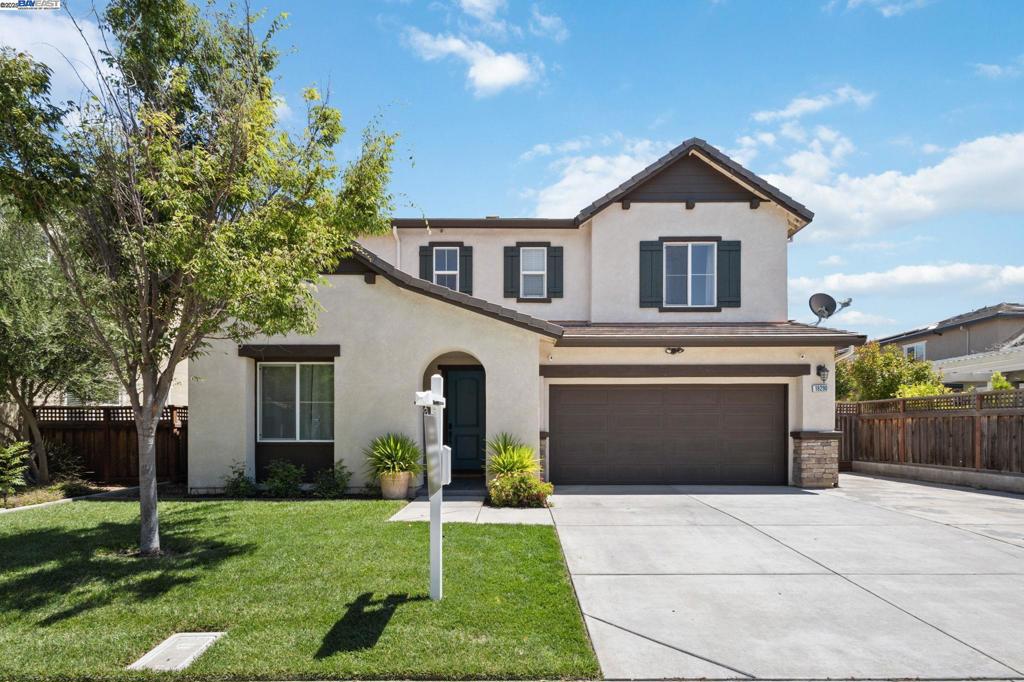 Sun-soaked elegance meets modern comfort at 18290 Commercial St in the coveted River Islands Community. Freshly painted and upgraded with sleek LED lighting, this nearly 2,900 sq. ft. home sits on a large premium lot in one of the most desirable locations in the neighborhood. Inside, an open, naturally lit floor plan offers a full bedroom and bath on the main level, perfect for guests or multi-generational living, along with both a spacious living room and family room featuring built-in surround sound. The main floor also includes a custom children’s reading nook, adding a whimsical touch for little ones. A generous dining area connects to the chef’s kitchen with granite countertops, stainless steel appliances, walk-in pantry, and a custom backsplash. Upstairs, the luxurious owner’s suite boasts a spa-inspired ensuite and custom-built closet. Two additional bedrooms, a full bath, and an enclosed loft/theater room with projector and built-in seating and storage (or potential fifth bedroom) add incredible versatility. Upgrades include a water filtration system, reverse osmosis in the kitchen, owned solar, luxury vinyl plank flooring, and a landscaped backyard with room for a pool. Steps away from top-rated schools, trails, lakes, the San Joaquin River, and The Boathouse Restaurant.