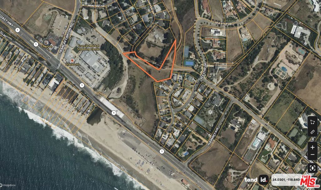 Prime white-water ocean view 1.64-acre lot across the street from Zuma Beach. Conveniently located next to Trancas Market Shopping Center, Starbucks, Vintage Grocery and to Malibu schools. Remarkable opportunity to build a private head on ocean view home on a grassy knoll with beach access to the sand and surf.
