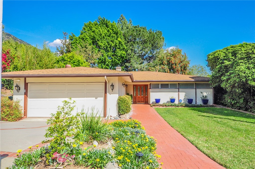 Highly desirable home located on a huge lot in the prime neighborhood of Sierra Madre. This single-story residence features a total of 3 bedrooms and 2 bathrooms, offering a perfect blend of modern comfort and classic charm. The upgraded kitchen features a central island, and high-end finishes. The great room creating a warm and inviting atmosphere. The luxurious master suite includes a spacious walk-in closet, additional storage, and an upgraded en-suite bathroom. There are two additional bedrooms in the house. The backyard is an entertainer's dream, featuring a resort-style pool and ample space for outdoor relaxation. Located in the prestigious Sierra Madre community, this home is located close to award-winning private high school, 5 minutes to 210 freeway, The Shops at Santa Anita, USC Arcadia Hospital, super markets, dining, and entertainment, walking distance to Pasadena High School Victory Recreation Center. Don't miss this incredible opportunity.