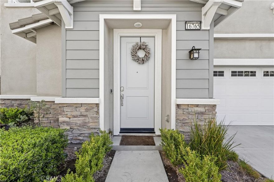 Welcome to 16765 Stags Leap Ln — where comfort, convenience, and community come together in Fontana’s highly desirable Gabion Ranch.



This beautifully maintained 3-bedroom, 2.5-bath home offers the perfect blend of modern living and family-friendly charm. The bright, open-concept floor plan feels inviting from the moment you walk in, with custom solar sun shades adding both elegance and energy efficiency throughout.



The kitchen is the heart of the home, featuring granite countertops, stainless steel appliances, and abundant cabinetry—designed to make cooking, entertaining, and everyday life effortless.



Upstairs, the spacious primary suite provides a private retreat with an en-suite bathroom and generous closet space. Two additional bedrooms offer flexibility for family, guests, or a home office. Modern conveniences like a whole-house fan, leased solar panels, and a tankless water heater keep the home comfortable and energy-efficient year-round.



Step outside to your low-maintenance backyard with durable artificial turf, offering a vibrant green space perfect for kids, pets, or weekend barbecues—all without the hassle of upkeep.



Beyond your doorstep, Gabion Ranch offers a lifestyle few communities can match. Enjoy resort-style amenities including sparkling pools, splash pads, fire pits, playgrounds, dog parks, and scenic walking trails. It’s a neighborhood where neighbors become friends, kids play safely, and families thrive together.



If you’ve been searching for a home that truly has it all—modern upgrades, energy-efficient features, resort-style amenities, and a prime location near the 210 and 15 freeways—look no further than 16765 Stags Leap Ln. Here, you’re minutes from shopping, dining, and top-rated schools, yet tucked inside a peaceful, family-friendly community built for connection and comfort. This isn’t just a house—it’s the lifestyle you’ve been waiting for. Don’t miss your chance to call it home.
