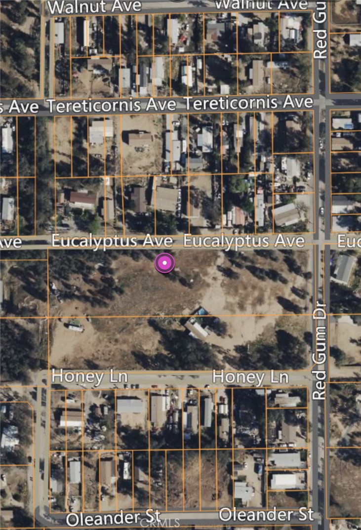 Embrace over 2.5 acres of peaceful rural residential land tucked among the scenic eucalyptus groves of Lake Elsinore. Perfect for your custom dream home or a private weekend getaway, this lightly wooded parcel sits on a paved road with utilities nearby. Enjoy flexible zoning that allows you to create a homestead, hobby farm, or personal retreat—just minutes from schools, shopping, and I-15. Bring your vision and make the rural-inland lifestyle your reality.