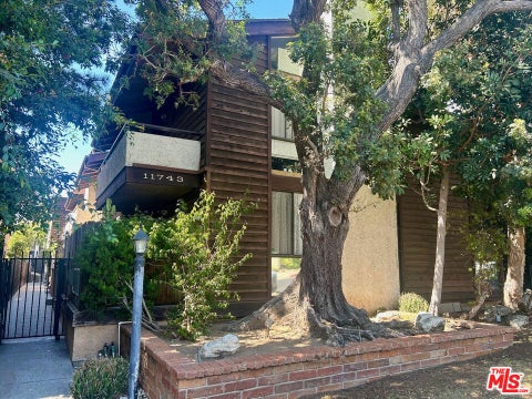 Photo of 11743 DARLINGTON Avenue #9, Los Angeles, CA 90049 (MLS # 26875319)