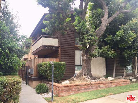 Photo of 11743 DARLINGTON Avenue #9, Los Angeles, CA 90049 (MLS # 26875319)