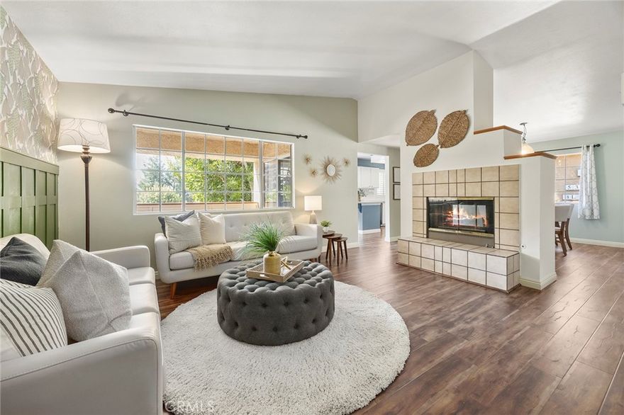 Welcome to 5370 Silver Canyon Rd., Yorba Linda – The Hills Community! This beautifully maintained 3-bedroom, 2-bathroom upstairs condominium offers the perfect blend of comfort, convenience, and style. With vaulted ceilings and a bright, open floor plan, the living spaces feel airy and inviting. The spacious primary suite includes a walk-in closet, an updated private bathroom, and direct access to the balcony—ideal for enjoying fresh air and natural light. The two secondary bedrooms are generously sized, offering flexibility for family, guests, or a home office. The dining area connects seamlessly to the expansive living room, creating an excellent space for both everyday living and entertaining. The kitchen features timeless white cabinetry, quartz countertops, and stainless-steel appliances, providing both function and modern appeal. Wood laminate flooring runs throughout the home, adding warmth and durability. Community amenities elevate the lifestyle experience, including a swimming pool, spa, fitness center, and tennis courts. Surrounded by scenic hiking trails and located near highly regarded schools, shopping, dining, and entertainment, this home combines tranquility with convenience. Easy access to major freeways makes commuting a breeze. Don’t miss the opportunity to own this charming Yorba Linda home in the desirable Hills community—schedule your showing today!  Carport #126&127