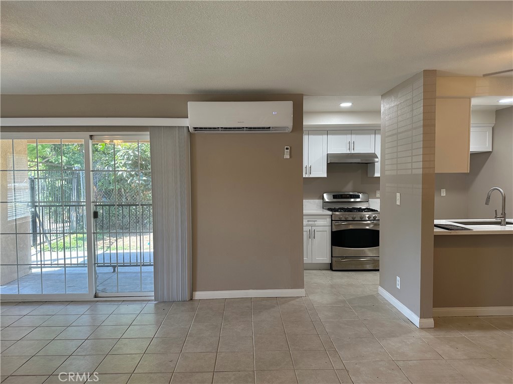 A very spacious, fully remodeled 3-bedroom 1.5-bathroom apartment with a private patio and a 1 car garage. Brand new kitchen, with new upscale cabinets that have soft closures, quartz counters, and stainless-steel convection range. The unit has a brand-new AC to keep you cool on those hot days and a cozy fireplace for the cold winters. New paint, trim, closet doors, hardware, ceiling fans, and lighting, throughout the home. Double Pane Windows with new blinds. The home also has a primary bedroom/bath, and the covered patio will be a great place to relax after a long day. A gated property located within walking distance of parks, great shopping, restaurants, and all the best the city has to offer. The rent price includes water, hot water, trash, and coin laundry. Tenant is responsible for electricity and gas.