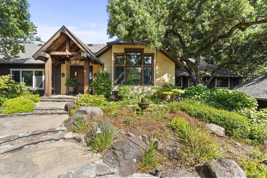 Welcome to this wonderful, gated, Woodside Estate. Situated on a 3.38 acre parcel at the end of a private lane, exemplifying Country living at its best. This custom-built home features massive rustic beams, unique millwork, high ceilings, and wide plank hardwood floors. The oversized great room/kitchen and living rooms encourage large gatherings. The bedroom wing consists of 3 en-suites, a bar area, powder & laundry rooms.  Adjacent to the kitchen, there's an office, walk-in pantry, mud room, and spacious pet grooming parlor. The private yards are accented by tall redwoods, majestic oaks, beautiful rose gardens, raised potting beds and views of the western hills. A free form pool with rock surround and waterfall, and a quaint guest cottage with a 4th loft bedroom, round out the rear yard. Luxurious country living yet close to Woodside Elementary, Roberts Market, hiking, & cycling. Truly a tranquil, serene, and private place to live, work and play.