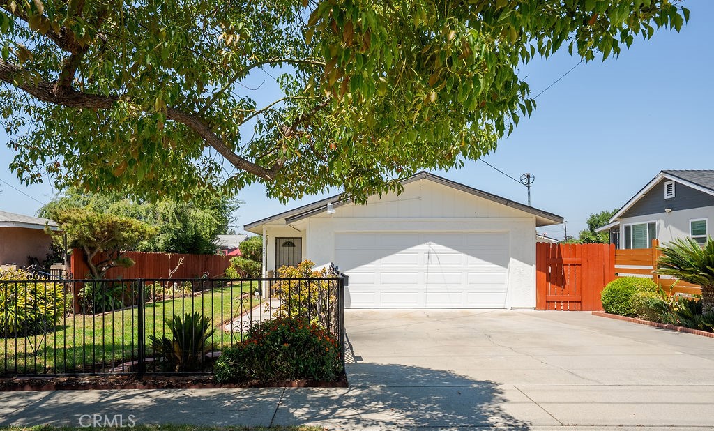 This charming 4-bedroom, 2-bathroom home offers 1,304 sq ft of living space on a generous 7,495 sq ft lot—perfect for anyone looking to create their dream home. Step inside to a spacious living room that flows seamlessly into the kitchen, offering the ideal layout for everyday living and entertaining. Freshly updated with new interior and exterior paint, this home also features a newer roof, a well-maintained A/C unit, and a two-car garage with a brand-new automatic door. The expansive backyard offers endless potential—whether you envision a lush garden, a space to host gatherings, or the opportunity to build an ADU for rental income or multigenerational living. Nestled in a sought-after area of Azusa with easy access to major freeways, schools, Costco, Target, and the scenic foothills of the San Gabriel Mountains—this location truly has it all. Don’t miss this blank canvas brimming with potential. Come see it before it’s gone!