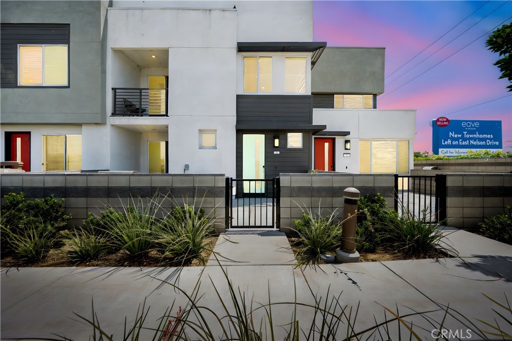 Welcome to this stylish and energy-efficient 2-bedroom, 2.5-bath townhouse built in 2023, ideally located in the vibrant neuhouse community of Ontario Ranch. This beautifully designed home features a functional and flexible layout with one bedroom and full en-suite bath conveniently located on the first floor—perfect for guests, office, or multigenerational living. Upstairs, enjoy an open-concept living area that seamlessly blends the kitchen, dining, and living spaces—ideal for both entertaining and everyday living. The well-appointed kitchen offers contemporary finishes, ample cabinet space, and flows effortlessly into the spacious great room. The generously sized upstairs primary suite includes a private bath and walk-in closet for added comfort and privacy.
Additional highlights include:
*Attached 2-car garage*
*LG stackable washer and dryer*
*Leased solar panels for energy efficiency and cost savings*
*Central A/C and modern finishes throughout*
Community amenities elevate your lifestyle with a resort-style pool and spa, BBQ grills, outdoor showers, fire pit, picnic area, and playground—perfect for relaxing or entertaining guests. Situated near schools, shopping, dining, and with easy access to major highways, this home combines contemporary comfort with everyday convenience. Don’t miss your chance to own in one of Ontario Ranch’s most desirable new community