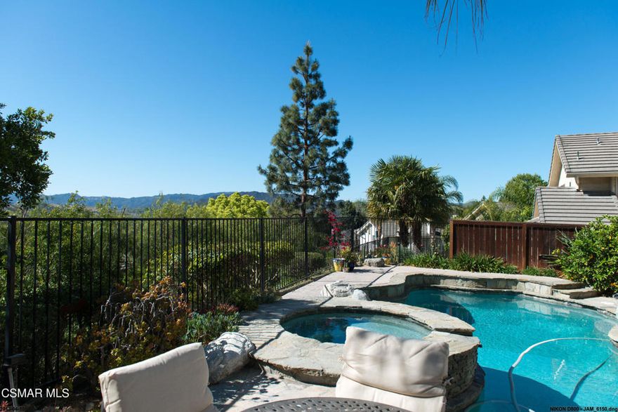 Amazing Ridgefield Oak Park home with panoramic views. Paid Tesla Solar with Tesla battery backup! Expanded kitchen, dining, family room and led in-ceiling lighting! Sit on your private balcony to enjoy the views of Oak Park and the mountains beyond. Kitchen boasts granite counters, gorgeous cabinetry, and stainless-steel appliances. Formal dining room and dining area in the kitchen! Spacious primary bedroom with en-suite featuring travertine shower, double vanity, and oversized tub. Additional features include double pane windows, French doors and tankless water heater. Relax and enjoy the outdoors in your private backyard, with a BBQ to entertain and a heated pool/spa with newer pool filter including an auto-fill feature. Fully finished garage with added loft storage above. Award Winning Oak Park School District! The 4th bedroom can be used as an office/retreat with no closet. Exceptional Location!