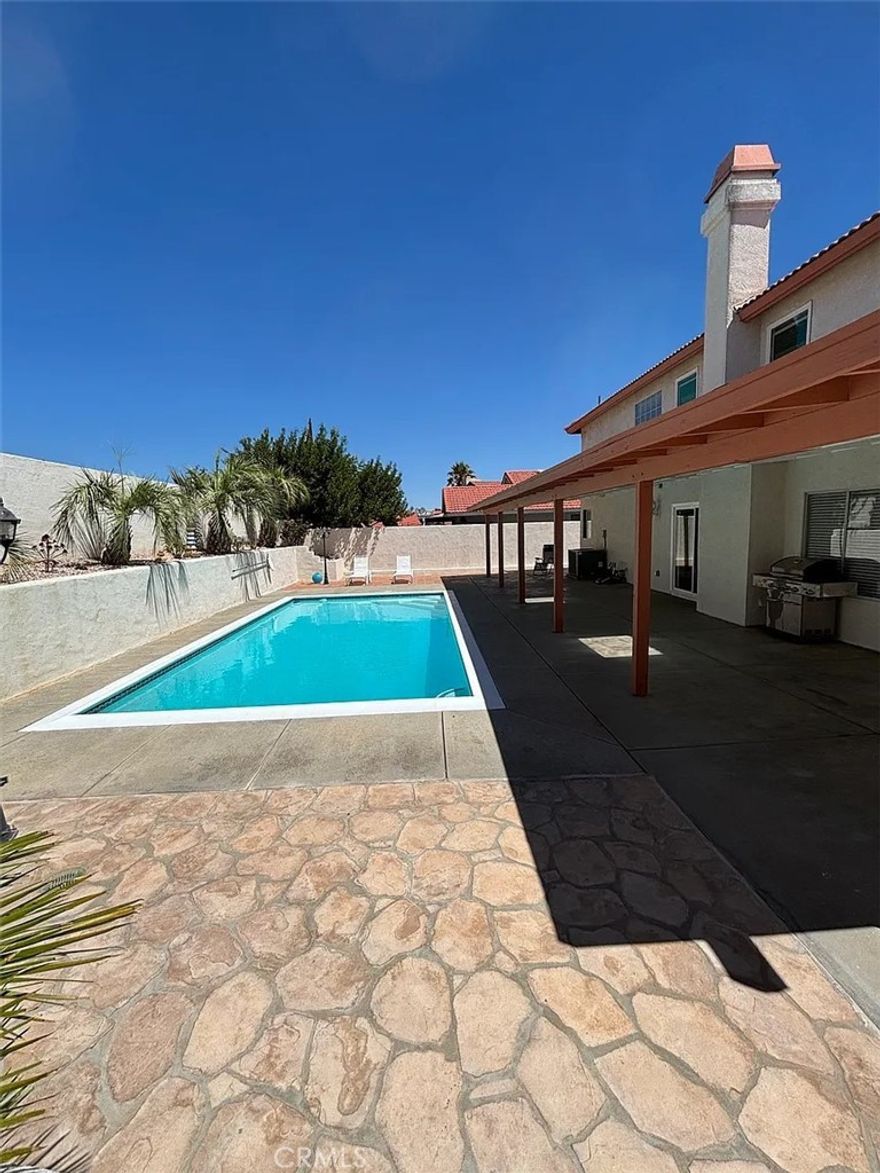 Beautiful Pool Home in Desirable Palmdale Neighborhood!



Welcome to this stunning 4-bedroom, 3-bathroom home located in one of Palmdale's most sought-after areas. All bedrooms are conveniently located upstairs, offering privacy and space for the whole family.



Step into a grand entry with high ceilings and abundant natural light. The elegant living room flows seamlessly into a formal dining area, featuring a sparkling crystal chandelier. The spacious family room includes a cozy fireplace, perfect for relaxing evenings.



The kitchen is a chef's dream, boasting granite countertops, modern backsplash, stainless steel appliances, and ample cabinet space. Rustic tile flooring runs throughout the home, blending charm with a contemporary touch.



Additional features include recessed lighting, a convenient laundry room, and a luxurious master suite complete with a walk-in closet and a spa-like bathroom.



Step outside into a private backyard oasis with a sparkling pool and a covered patio ideal for entertaining guests or enjoying quiet family time.



Don't miss the opportunity to make this beautiful home yours!



Tenant is responsible for all utilities. 

Owner pays for landscaping service and pool service.