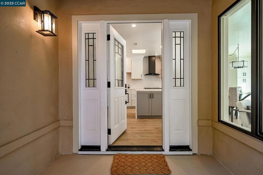 Beautifully Remodeled Yosemite 2-Bedroom / 2-Bath Home in a Private Setting! This remodeled Yosemite home offers modern comfort, style, and functionality at every turn. Step into the stunning custom kitchen featuring brand-new appliances, abundant cabinetry, a built-in wine cooler, and a spacious cooking and serving island—ideal for both everyday living and entertaining. Designed with a cohesive flow, the kitchen and both bathrooms showcase coordinated cabinetry, stylish tile accents, and elegant finishes throughout. Every detail has been thoughtfully selected to enhance comfort and convenience. The home features new cabinets and flooring, stylish hardware, mirrored closet doors, and a walk-in closet with tube lighting. A conveniently placed interior washer and dryer make daily living effortless, while the sleek tiled backsplash and contemporary design choices add a modern touch. The expansive patio provides the perfect space for outdoor gatherings and quiet relaxation, seamlessly blending indoor and outdoor living. Additional highlights include a carport and exterior storage for extra convenience. Move-in ready and beautifully updated, this home combines modern design, everyday practicality, and private surroundings—perfect for those seeking to enjoy a relaxed lifestyle.