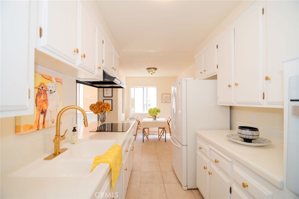 Beautifully renovated beach-city spacious 1 bedroom, 1.5 bathroom, 852sf in artsy 32-unit controlled-access condominium community on quiet cul-de-sac street in Playa Del Rey. 1-car assigned parking in gated-subterranean garage. Updates include fresh new paint, new carpet, newly reglazed counter-tops, sinks, tub and shower. Laundry is only 3 steps from unit. Very low HOA dues are $363 per month. HOA amenities include sauna, recreation room, ocean-view roof-top deck, earthquake and liability insurance for building common areas. Walk to the beach, delicious restaurants and cafes, fine shopping, farmers market, bike paths, parks, minutes from Loyola Marymount University, LAX, Marina Del Rey, Venice, and booming silicone beach. Welcome to your new stylish beach-city home!