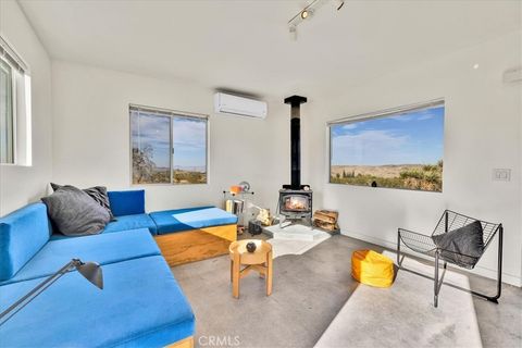 Photo of 2625 Geronimo Trail, Landers, CA 92285 (MLS # JT26072933)