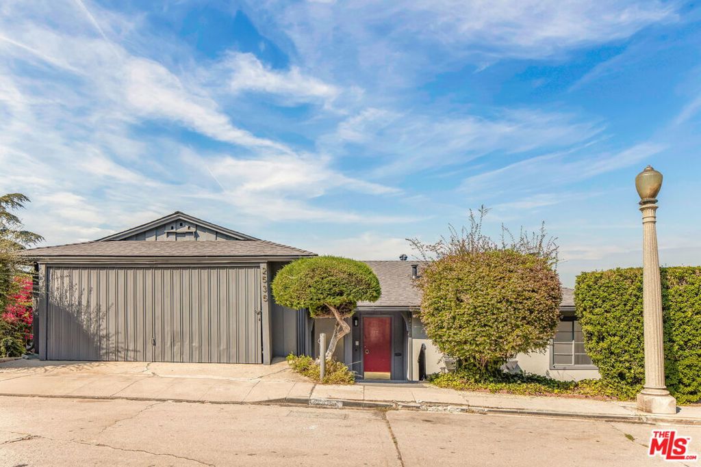 Perched in the hills of Silver Lake this beautiful Mid-Century homes offers gorgeous views of city lights and the San Gabriel Mountains. Featuring a lovely open floor plan with tons of natural light original refinished hardwood floors and period design elements that highlight the home's heritage. The updated kitchen is perfect for the most seasoned chef with stainless steel appliances and a cozy breakfast nook. An oversized primary suit with sweeping views, walk in closet and a large bathroom with a tub and shower. Downstairs you have well appointed guest rooms with a bathroom and laundry room. Lastly you have the perfect space for an oversized den, game room or family room with sliding glass doors to a massive deck that is surrounded by lush landscaping with gorgeous views. Truly a special property that you don't want to miss!
