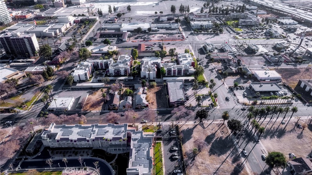 The property features water access and is a rectangular parcel zoned CR-2 (Commercial Regional 2) in Downtown San Bernardino. It is conveniently located near the 215 Freeway, Greyhound Bus Station, and the San Bernardino Airport, just blocks from Downtown and City Hall. The property, located near the newly revitalized Carousel Mall, offers potential for housing, retail, and mixed-use developments. It's also across from Telacu Senior Housing Development, Pioneer Park, and is near senior living facilities, motels, retail, residential areas, and other businesses. It is zoned for multi-family housing and mixed-use commercial creating a profitable investment (parkin lot, auto repair shop, new residential development, etc.) in this prime location with easy access to transportation and amenities. The diverse range of nearby amenities and attractions make this property an ideal location for a variety of development opportunities. With its strategic location and zoning allowances, investors have the potential to capitalize on the growing demand for housing and commercial space in this area. Buyers should independently verify all details related to the property, including but not limited to zoning, lot size, boundaries, building requirements and their intended use.
