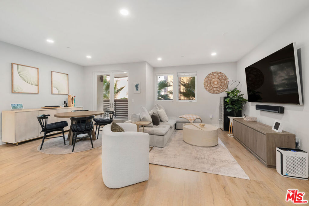 Built in 2019, discover the ultimate in coastal living with this stunning residence at The Seabluff Flats, ideally located in the heart of Playa Vista. This beautifully upgraded 2-bedroom, 2-bathroom condo sits on the 3rd floor and offers the perfect blend of style, comfort, and convenience. Step inside to an open floor plan featuring wide-plank flooring, recessed lighting, and an inviting layout. The chef's kitchen boasts quartz countertops, custom cabinetry, and premium KitchenAid appliances, perfect for entertaining or enjoying a quiet night in. The spacious primary suite includes a walk-in closet, dual vanities, and a sleek shower. The 2nd bedroom also has a walk-in closet.From the expansive private deck, take in tranquil treetop views that make indoor-outdoor living effortless. Additional highlights include a full-size washer/dryer in-unit and central AC. 2 parking spaces, side by side, storage unit, guest parking and EV charging.As a resident of Playa Vista, you'll enjoy access to exceptional amenities including resort-style pools, spas, multiple gyms, clubhouses, and beautifully landscaped parks. Just a short stroll away is the Runway at Playa Vista, home to Whole Foods, CVS, Cinemark theaters, and a variety of dining options. Right outside your door, you'll find everyday conveniences such as Yummy Market, Coffee Bean, and Concert Park with its community events, local restaurants, and neighborhood services. This home truly captures the best of the Southern California lifestyle. Don't miss your chance to own in one of Playa Vista's most sought-after communities!