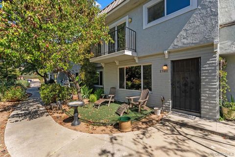 Photo of 9401 Carlton Oaks Drive Dr #E, Santee, CA 92071 (MLS # 260007136SD)