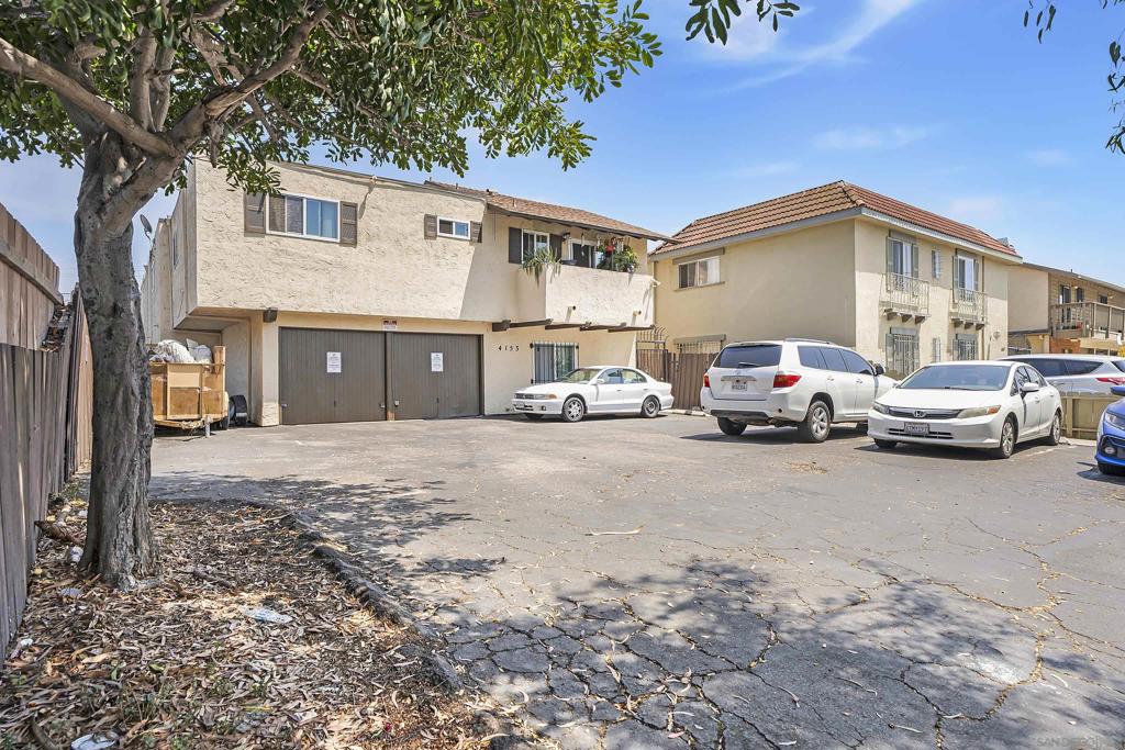 Loads of character and investment potential in this well-maintained 8-unit apartment building located in the desirable Teralta Heights neighborhood of central San Diego! The centerpiece of the property is a spacious Townhouse-Style 3BR unit with a private balcony, direct access from an attached 1-car garage into the first-floor bedroom, and two additional bedrooms upstairs—perfect for an owner’s unit or premium rental. The remaining seven 1BR/1BA units are situated on both the first and second levels, offering a mix of layouts and finishes. Several units have been updated with luxury vinyl plank and carpet flooring, granite kitchen countertops, and modern appliances including dishwashers, refrigerators, and range/ovens. Every unit has newer windows throughout, adding to efficiency and appeal. Parking is abundant and includes two 1-car garages, four covered carport spaces in the rear, and 5–8 uncovered spaces in the front. The property is securely gated for resident peace of mind. Excellent upside potential for investors to remodel units, enhance curb appeal, and/or increase rents for greater cash flow. Outstanding location near Teralta Park, local shops, and an exciting variety of restaurants and nightlife—all within walking distance. Convenient access to major freeways and the San Diego Trolley makes commuting a breeze, while the vibrant surrounding community adds to long-term rental demand. A rare opportunity to own a character-rich multi-unit property in a high-demand rental market! Outstanding opportunity to acquire an 8-unit multifamily property in the sought-after Teralta Heights neighborhood of central San Diego. This property combines immediate rental income with excellent upside potential through value-add improvements and rent optimization. The current mix includes one large townhouse-style 3BR/2BA unit with private balcony and direct garage access, plus seven 1BR/1BA units in a well-maintained, gated complex. Several units have already been updated with luxury vinyl plank flooring, granite kitchen countertops, and modern appliances including dishwashers, refrigerators, and range/ovens. All units feature newer windows, reducing maintenance costs and enhancing tenant satisfaction. Unit Mix & Parking The front townhouse-style unit offers unique appeal for an owner-occupant or premium rental. The property includes two single-car garages, four covered carport spaces in the rear, and 5–8 uncovered parking spaces in the front—an uncommon advantage in this dense urban area and a major leasing draw. Value-Add Potential This is a prime candidate for investors seeking to increase cash flow. Opportunities include upgrading remaining units to match the remodeled finishes, improving common areas for greater curb appeal, and adjusting rents to market rates in line with the high rental demand of the 92105 ZIP code. The property’s configuration and location also make it a strong candidate for furnished corporate or student housing, further increasing potential gross income. Market & Location Advantages Teralta Heights is part of the dynamic and culturally rich City Heights community, one of San Diego’s most walkable and transit-accessible neighborhoods. The property is located near Teralta Park, grocery stores, and a wide range of restaurants offering global cuisines, from Vietnamese in the Little Saigon Cultural District to Ethiopian, Middle Eastern, and Mexican options along University Avenue. Nightlife, live music, coffee shops, and cultural events add to the area’s renter appeal. Transportation & Access Situated just minutes from I-15, I-805, and I-8, the property offers quick connections to Downtown San Diego, Balboa Park, San Diego State University, and other major employment centers. The San Diego Trolley and multiple bus routes provide reliable public transit for residents who prefer car-free living, broadening the potential tenant pool. Demographics & Demand City Heights maintains one of the highest rental occupa...