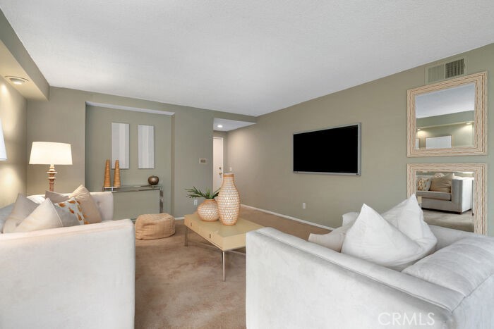 This bright and spacious top-floor corner unit is quietly tucked away at the back of a serene complex located in the heart of Pasadena’s desirable South Lake District, just a short walk to Caltech, shopping, dining, and more. The open-concept layout features a generous living room that flows seamlessly to a private balcony—perfect for both relaxing and entertaining. The adjacent dining area and well-appointed kitchen offer both comfort and functionality.
The home includes two large bedrooms and two bathrooms, enhanced by abundant natural light and a skylight that adds to the airy ambiance. With easy access to the 210, 134, and 110 freeways, commuting is a breeze.