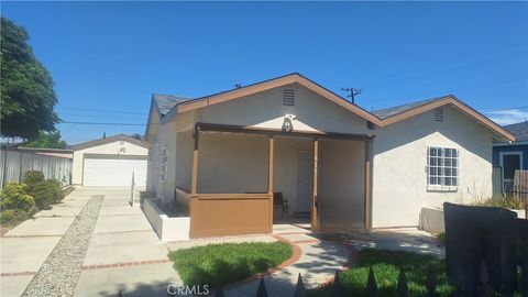Photo of 815 W 134th Place Pl, Compton, CA 90222 (MLS # IN26077993)