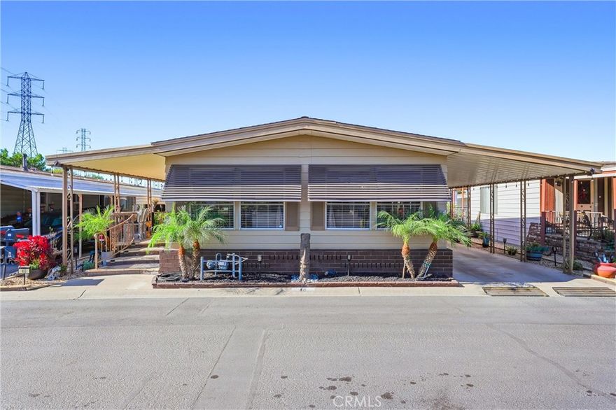 What a beauty! 1400 S. Sunkist #48 truly doesn’t disappoint. Located in one of the most desirable 55+ communities—with one of the lowest leased-land fees and a vibrant calendar of activities—this home is packed with upgrades and move-in ready. Enjoy custom interior paint, all-new appliances, upgraded flooring, surround sound in the den, and beautifully remodeled bathrooms. The spacious den features a cozy fireplace, and the fully remodeled kitchen shines with modern finishes. Outside, you'll find two storage sheds, fresh exterior paint, a custom retro wet bar, and more. Fantastic location to so many fun things like The Pond, restaurants, shopping, Angel stadium, Downtown Disney, and more. This one has it all—come see for yourself how lovely it really is!