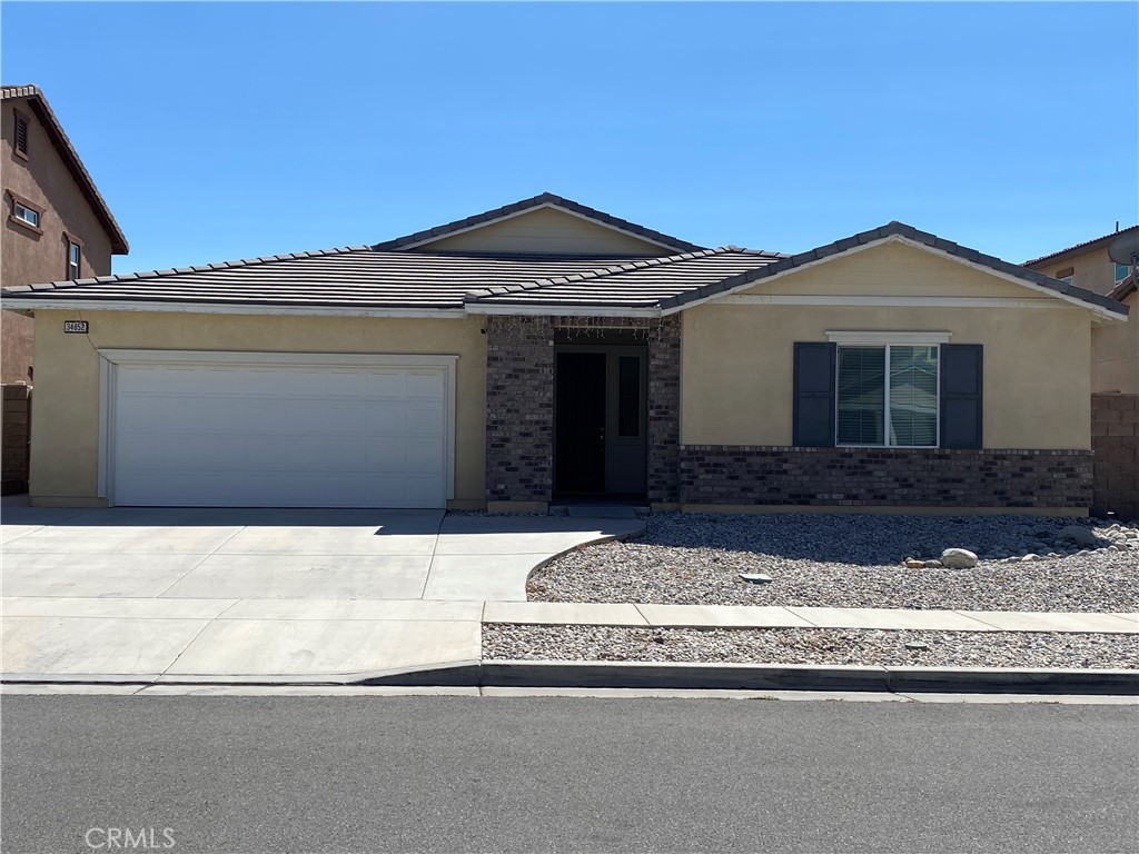A RARE FIND!! This single-story home has over 2,800 square feet of living space, 4 beds/4 baths with an open concept floorplan, including an additional junior suite that gives an added bonus for the multi-generational family-style living. As you enter the home notice the 20x20 ceramic tile that lead throughout. At the front of the home are two spacious guest bedrooms that share a Jack and Jill full bath. An additional guest powder room is also located near entry. Moving down the entry hallway is a room currently being used as an office or can be your formal dining room. Another added feature is the huge open concept layout of the great room, kitchen, and eating area, where the family gathers. The family room features a built-in fireplace for those cooler evenings. A large kitchen featuring a huge, oversized island with breakfast bar, granite countertops, upgraded cabinetry, stainless steel appliance, pantry, and desk area. The master bedroom is off of the family room, has walk in shower, dual sinks and walk in closet The backyard is surrounded by vinyl fencing and a low maintenance backyard. This home also has a finished, two-car garage. Located in the Murrieta-award-winning school district and walking distance to a local park at the end of the cul-de-sac. This home is pristine and has been kept immaculate. Close to shopping, schools and hospitals. Come take a look before it is gone!!