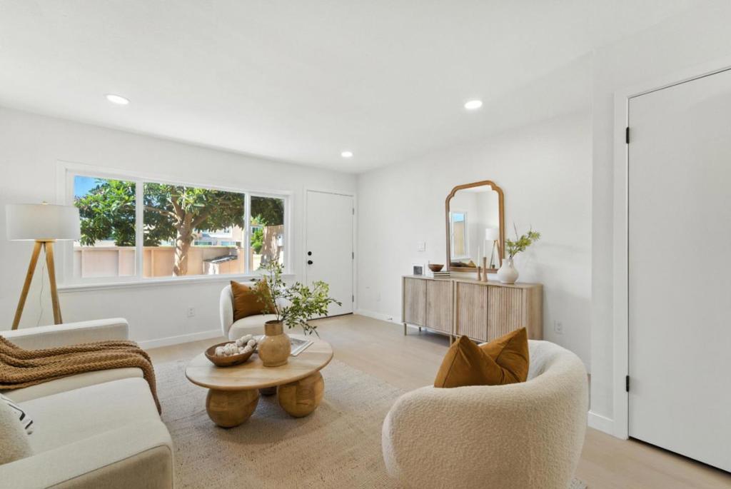 Welcome to this bright and airy 2-bedroom, 1.5-bath home, ideally located just steps from Regional Medical Hospital, local pharmacies, and doctors' offices perfect for anyone seeking unmatched convenience. This home features a sun-filled layout with large windows and plenty of natural light. Enjoy a thoughtfully designed kitchen equipped with a refrigerator, microwave, and dishwasher, plus the convenience of an in-unit washer and dryer upstairs. Two assigned parking spaces are located right at the back door for easy access! With quick freeway access, this home is a commuter's dream. Whether you're a first-time buyer or investor, this home offers the perfect blend of comfort, location, and value. Dont miss out this home.